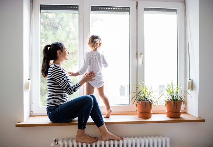 mother with kid in window