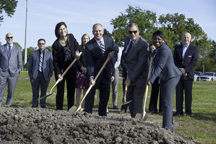 Chartway executive team breaking ground on new modern branch.