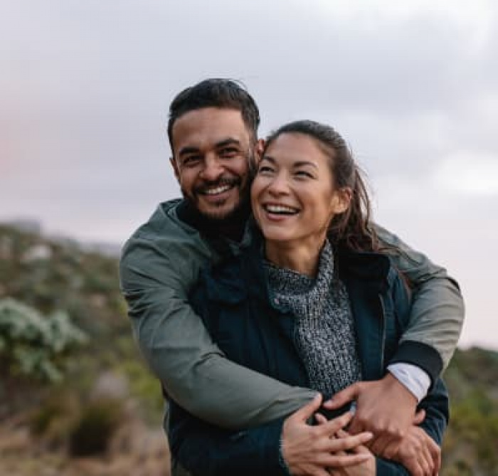 Romantic young couple on country trail