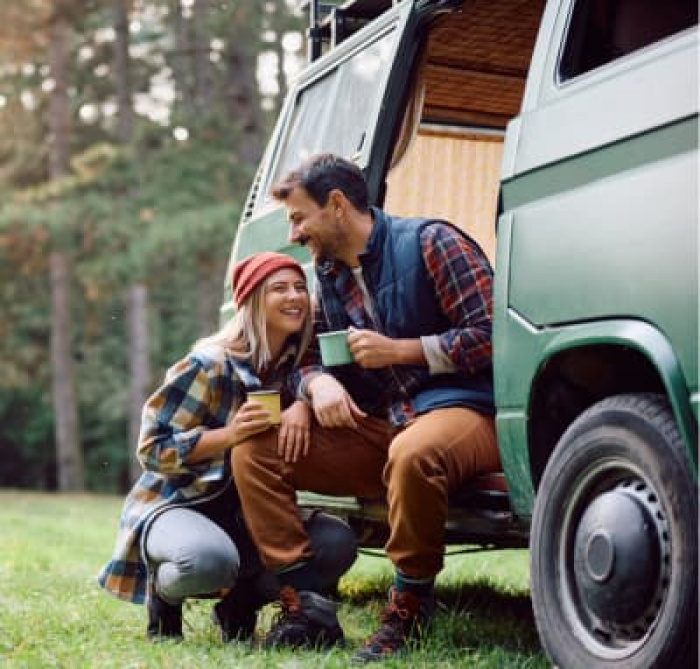 A couple wearing flannel enjoying time together outdoors