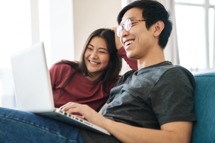 Cheerful young couple Preparing for home ownership