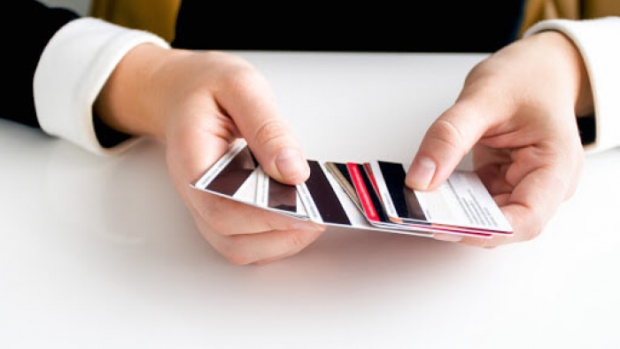 stack of credit and debit cards