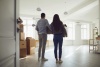 a young couple buys their first home